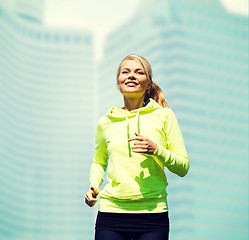 Image showing woman jogging outdoors