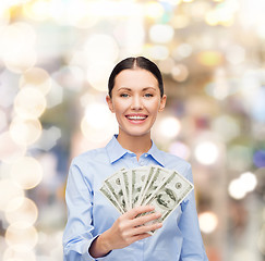 Image showing businesswoman with dollar cash money