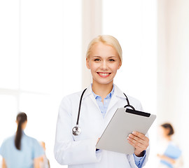 Image showing female doctor with stethoscope and tablet pc