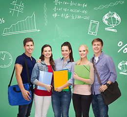 Image showing group of smiling students with folders and bags