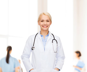 Image showing smiling female doctor with stethoscope