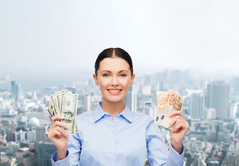 Image showing businesswoman with dollar cash money