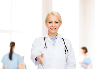 Image showing smiling female doctor with stethoscope