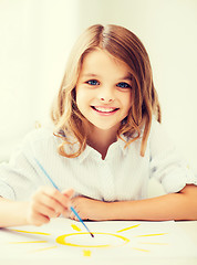 Image showing little girl painting at school