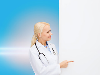 Image showing smiling female doctor with stethoscope