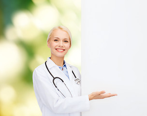 Image showing smiling female doctor with stethoscope