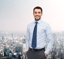 Image showing smiling young and handsome businessman