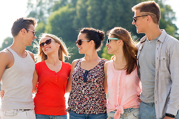 Image showing group of smiling friends in city