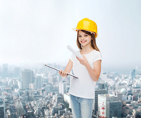 Image showing smiling little girl in protective helmet