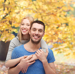 Image showing smiling couple hugging