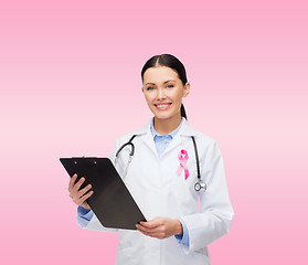 Image showing female doctor with stethoscope and clipboard