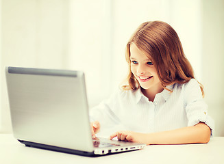 Image showing girl with laptop pc at school