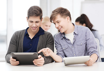 Image showing students looking at tablet pc in lecture at school