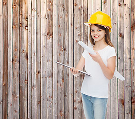 Image showing smiling little girl in protective helmet