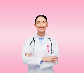 Image showing doctor with stethoscope, cancer awareness ribbon