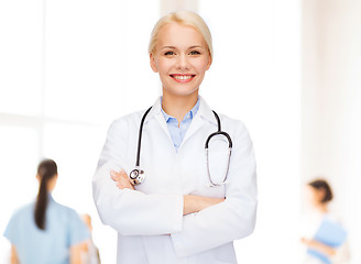 Image showing smiling female doctor with stethoscope