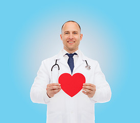 Image showing smiling male doctor with red heart and stethoscope