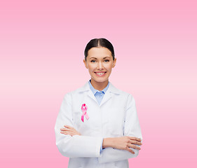 Image showing smiling female doctor with cancer awareness ribbon