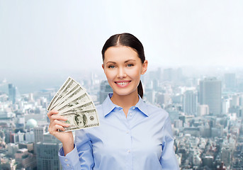 Image showing businesswoman with dollar cash money