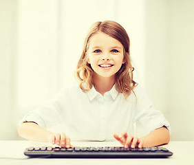 Image showing student girl with keyboard