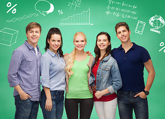 Image showing group of smiling students over green board