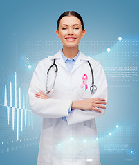 Image showing doctor with stethoscope, cancer awareness ribbon
