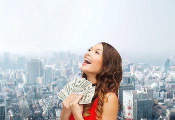 Image showing woman in red dress with us dollar money