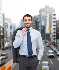 Image showing smiling young and handsome businessman