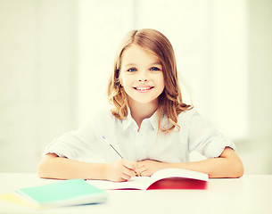 Image showing student girl studying at school