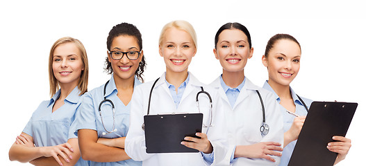 Image showing smiling female doctors and nurses with stethoscope