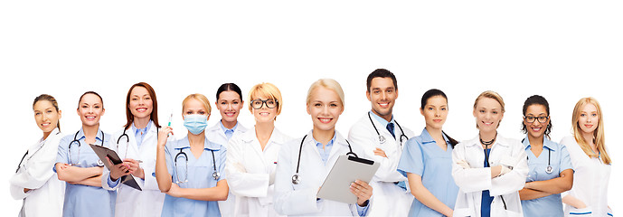 Image showing smiling doctors and nurses with tablet pc