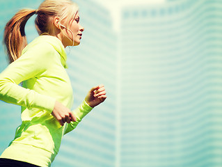 Image showing woman doing running outdoors