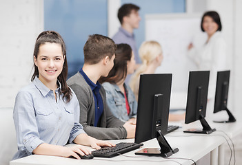 Image showing students with computer monitor at school