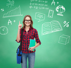 Image showing smiling student girl showing thumbs up