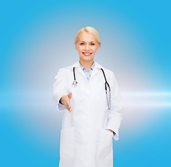 Image showing smiling female doctor with stethoscope