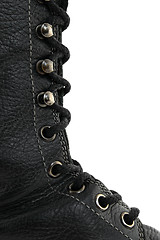 Image showing Closeup of black leather boot