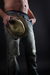 Image showing Attractive man with a straw hat