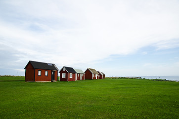 Image showing Fishermens old red cabins