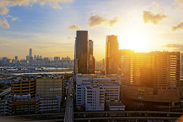 Image showing Urban downtown city at sunset,