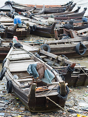 Image showing Boats along a polluted seaside in Myanmar