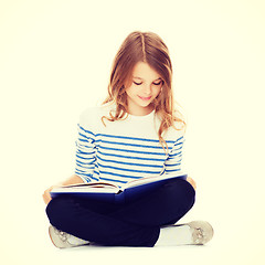 Image showing student girl studying and reading book