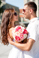 Image showing smiling couple in city