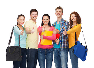 Image showing group of smiling teenagers showing thumbs up