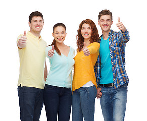 Image showing group of smiling teenagers showing thumbs up