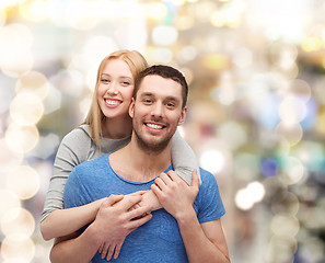 Image showing smiling couple hugging