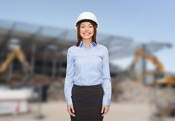 Image showing businesswoman in white helmet