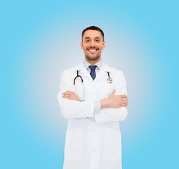 Image showing smiling male doctor with stethoscope