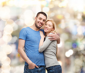 Image showing smiling couple hugging