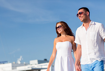 Image showing smiling couple in city
