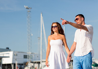 Image showing smiling couple in city